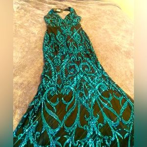 Brand new black and emerald sequins gown size Medium